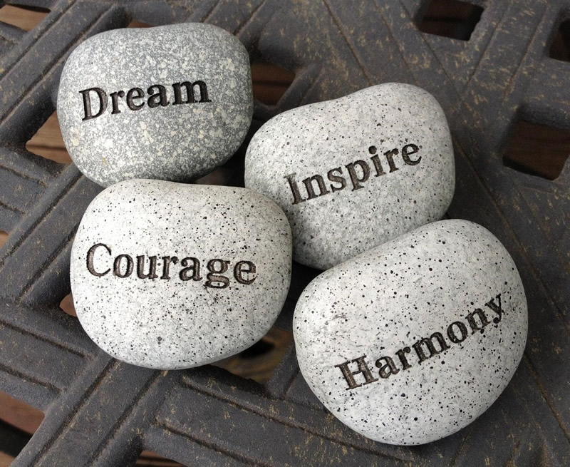 stones with writings dream, courage, inspire, harmony